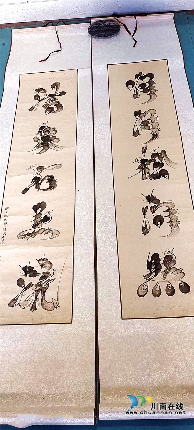 图4：巫显家用花鸟拼写的书法作品.jpg
