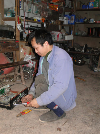 那株路边的小草——记下肢瘫痪的家电维修工张登明(图3)