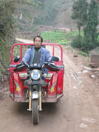 那株路边的小草——记下肢瘫痪的家电维修工张登明(图2)