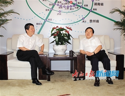 唐利民与工行四川省分行副行长韩松共商合作事宜