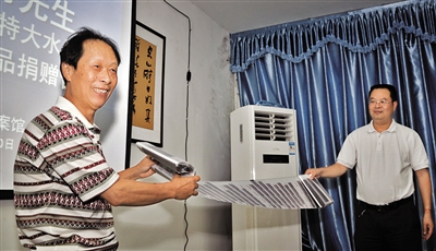 内江市首批纪实摄影作品“入驻”市档案馆(图1)