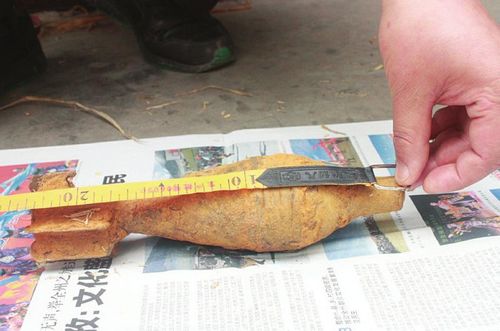 泸州纳溪打古镇一老汉发现一枚川南剿匪时遗留炮弹(图3)