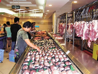 内江冷鲜肉市场“冷飕飕”(图1) 内江冷鲜肉市场“冷飕飕”(图1)