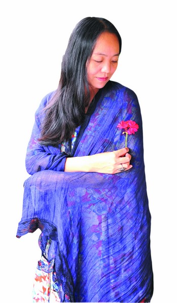 酒城新报旅行家作家罗丹萍:飘萍万里他乡路(图1)