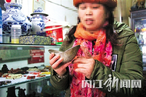 50两银锭被调包？内江两家古玩店业主起纠纷(图2)