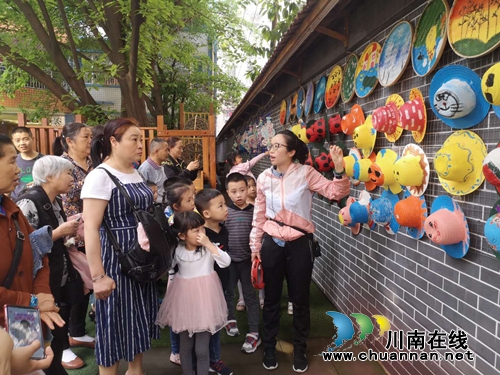 龙马潭区小市幼儿园举行民间手工艺作品展示(图1)