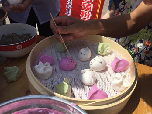 匠心传承技艺&nbsp;高手角逐宜宾红桥猪儿粑制作大赛(图2)