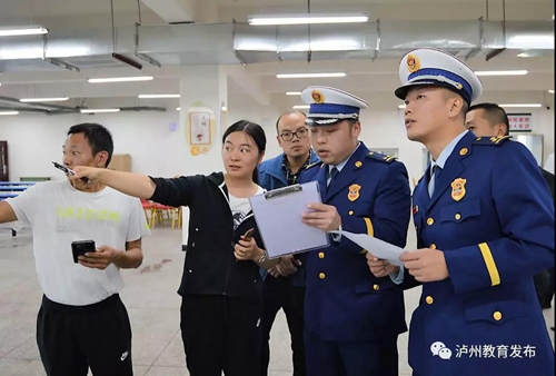 消防比武&nbsp;泸州市举行教职工安全知识技能大赛(图8)