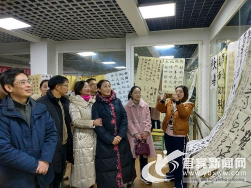 宜泸两地书法家协会共同举行迎春书法交流笔会(图1)