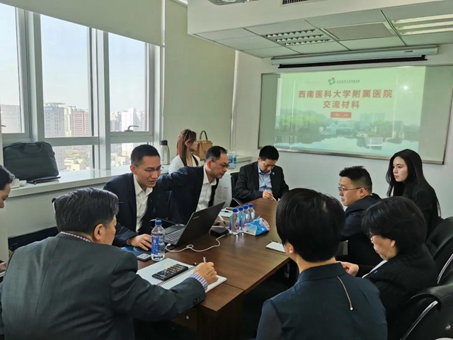 西南医大附院院长江涌带队前往复旦医院研究所学习交流(图1)