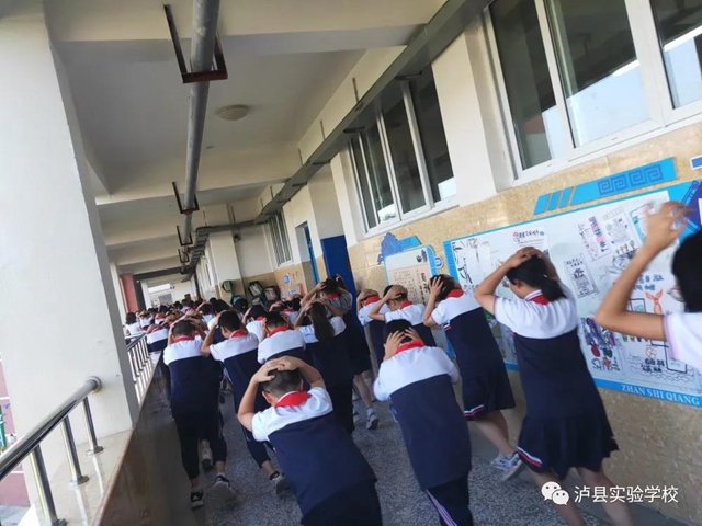 泸县实验学校开展预防地震应急疏散演练活动(图6)